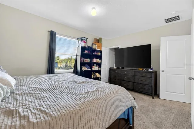 a bathroom with a sink double vanity and a mirror