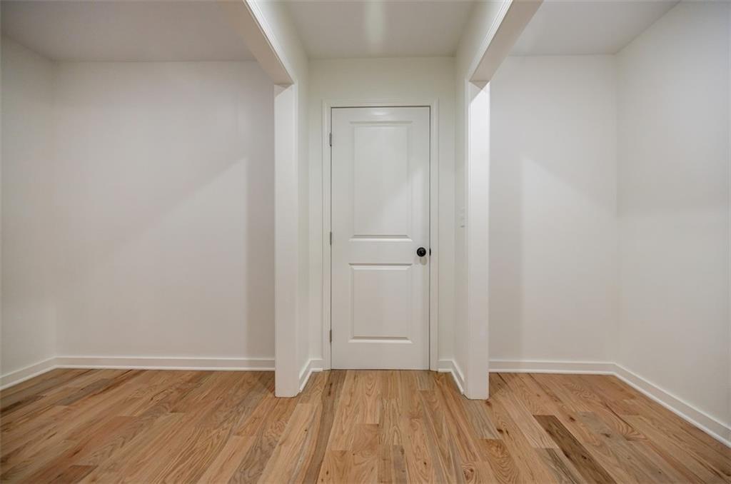 3154 North Druid Hills Road Northeast Decatur, GA 30033 - Photo 65 of 82 a view of an empty room and wooden floor