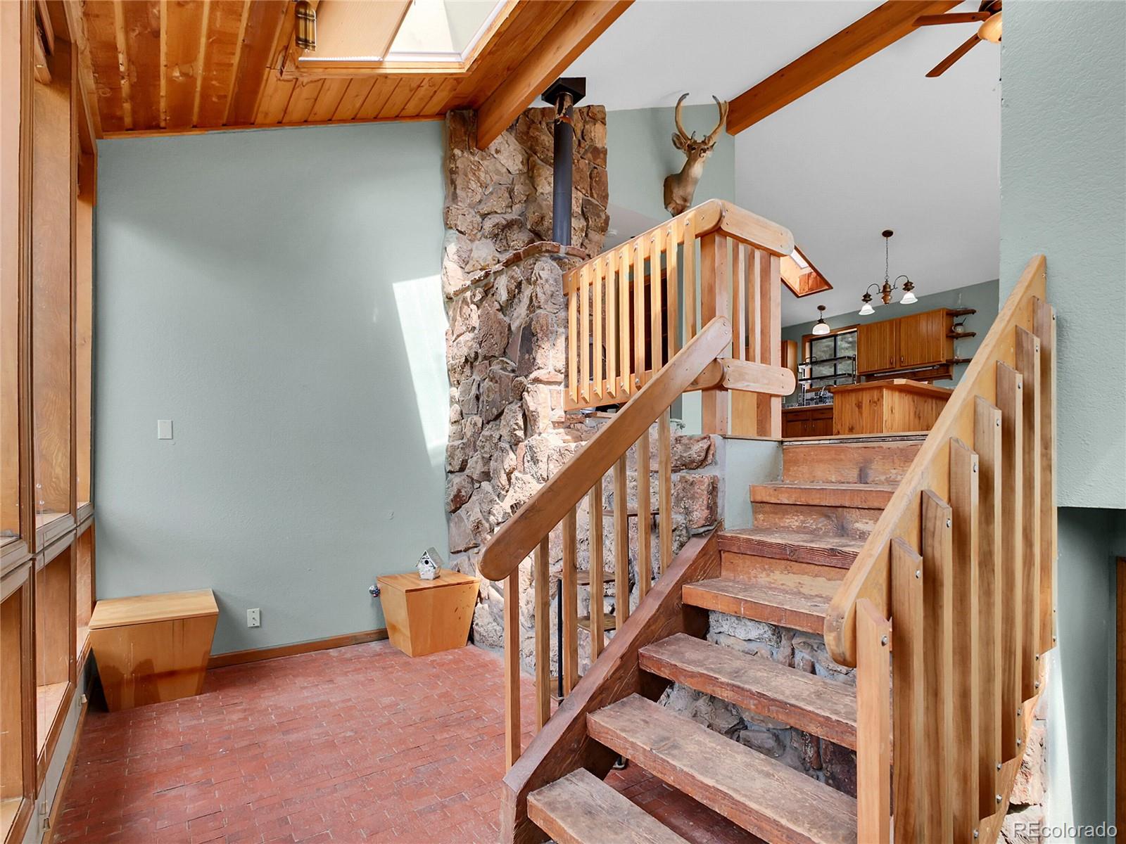8310 South Warhawk Road Conifer, CO 80433 - Photo 4 of 17 Gallery Image 4