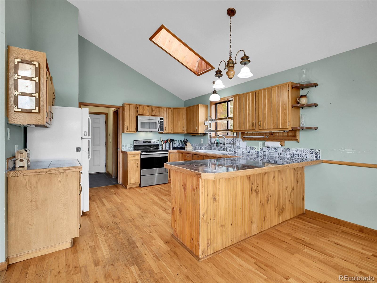 8310 South Warhawk Road Conifer, CO 80433 - Photo 9 of 17 Gallery Image 9