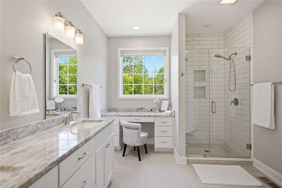 105 Winterbrook Circle Seneca, SC 29678 - Photo 22 of 48 This primary bathroom features pristine fixtures and ample natural light, creating a bright and inviting atmosphere.