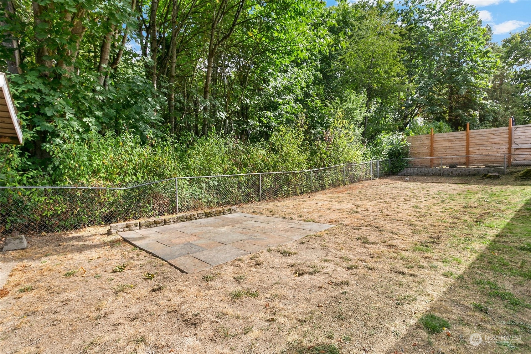 2300 Southeast 19th Street Renton, WA 98055 - Photo 25 of 33 a backyard of a house with lots of green space