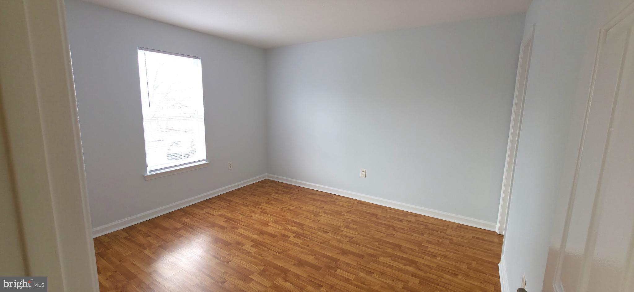 11228 Torrie Way, Unit G Bealeton, VA 22712 - Photo 18 of 30 a view of an empty room and window