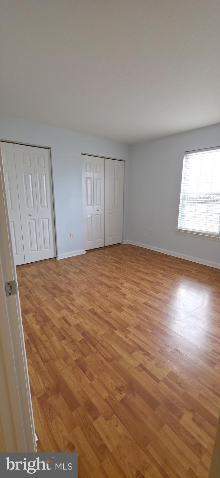 11228 Torrie Way, Unit G Bealeton, VA 22712 - Photo 25 of 30 a view of an empty room and window