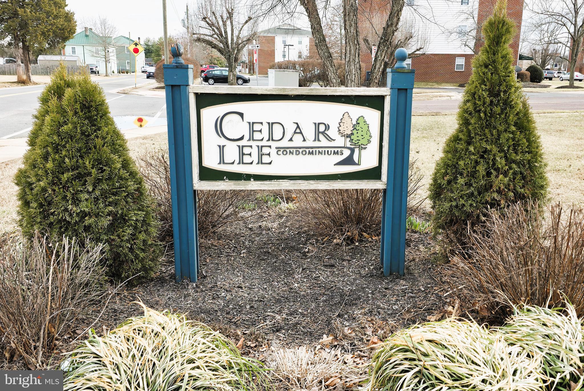 11228 Torrie Way, Unit G Bealeton, VA 22712 - Photo 4 of 30 a sign broad on the side of the road