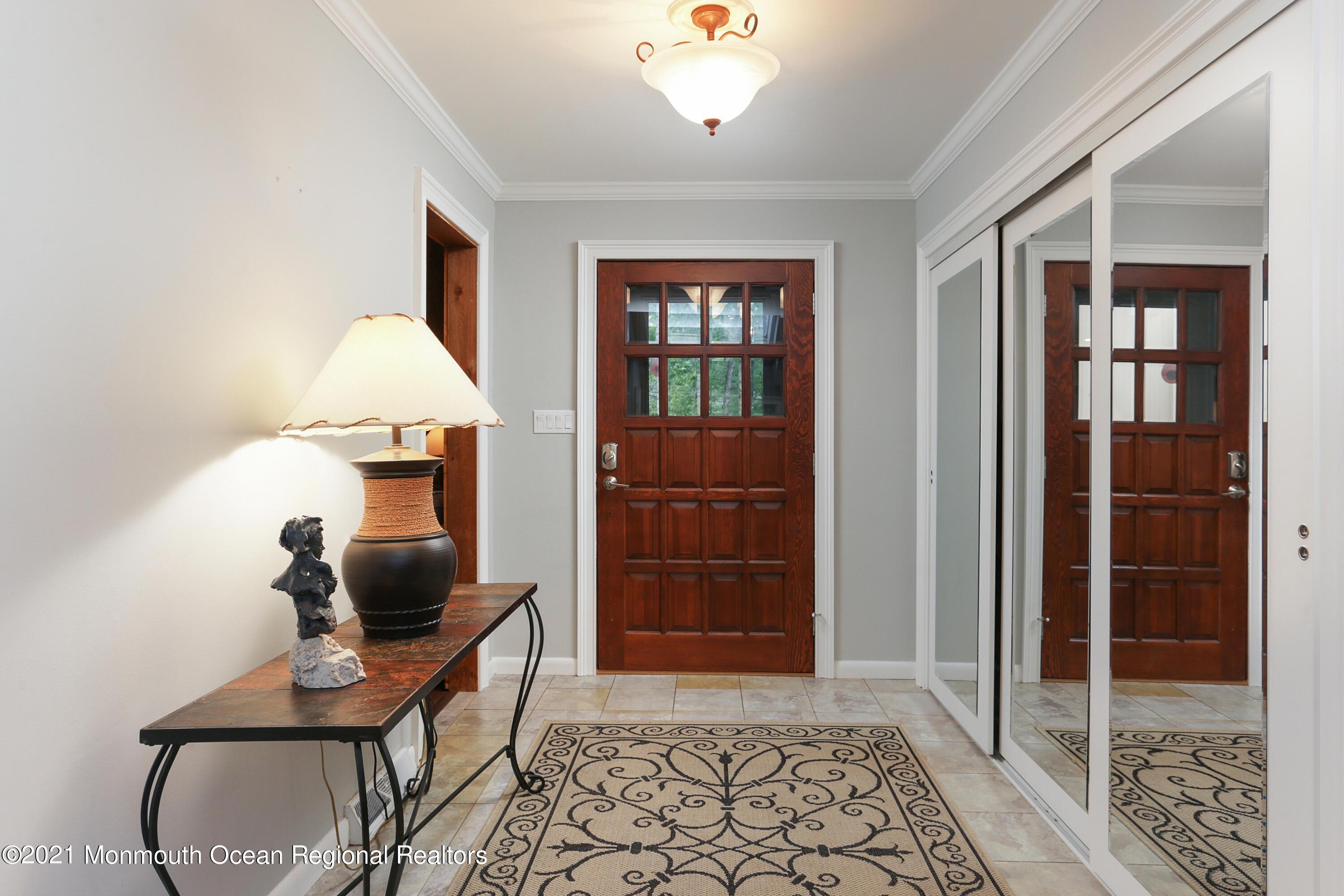 719 Gail Chambers Road Jackson, NJ 08527 - Photo 3 of 34 a view of a workspace with furniture and a window
