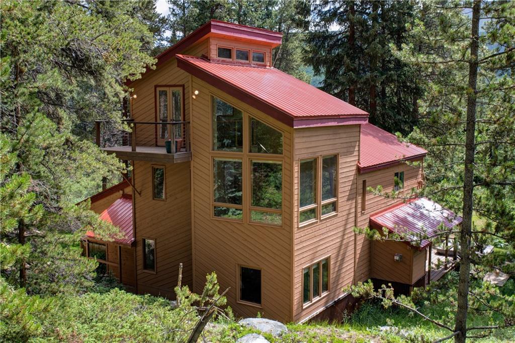 224 Spruce Creek Road Breckenridge, CO 80424 - Photo 2 of 21 a front view of a house with a yard