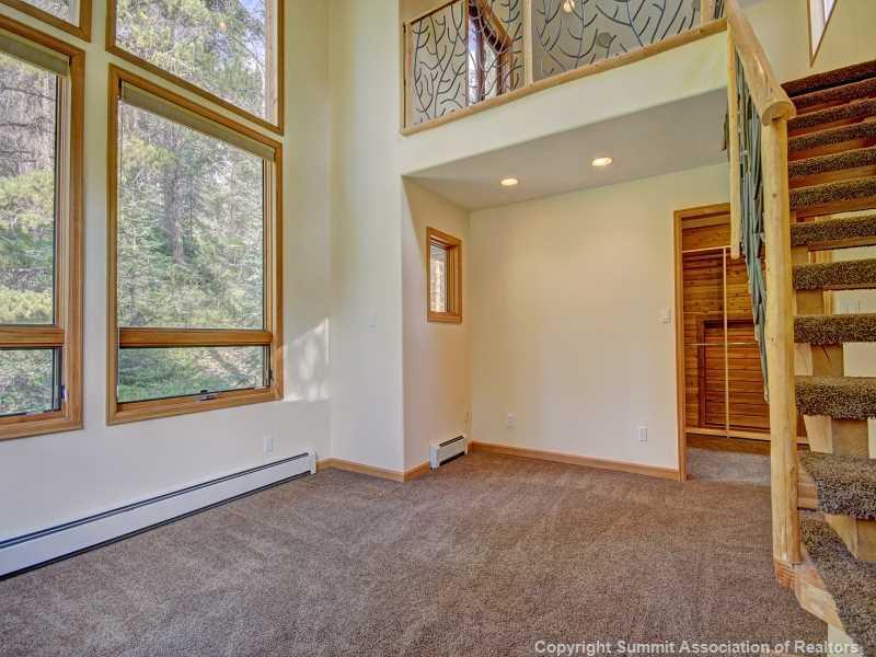 224 Spruce Creek Road Breckenridge, CO 80424 - Photo 16 of 21 an empty room with windows