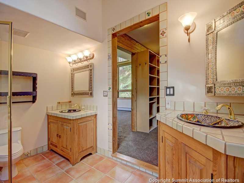 224 Spruce Creek Road Breckenridge, CO 80424 - Photo 19 of 21 a kitchen with a sink stove and refrigerator