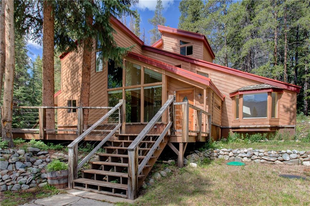 224 Spruce Creek Road Breckenridge, CO 80424 - Photo 3 of 21 a front view of a house with a yard