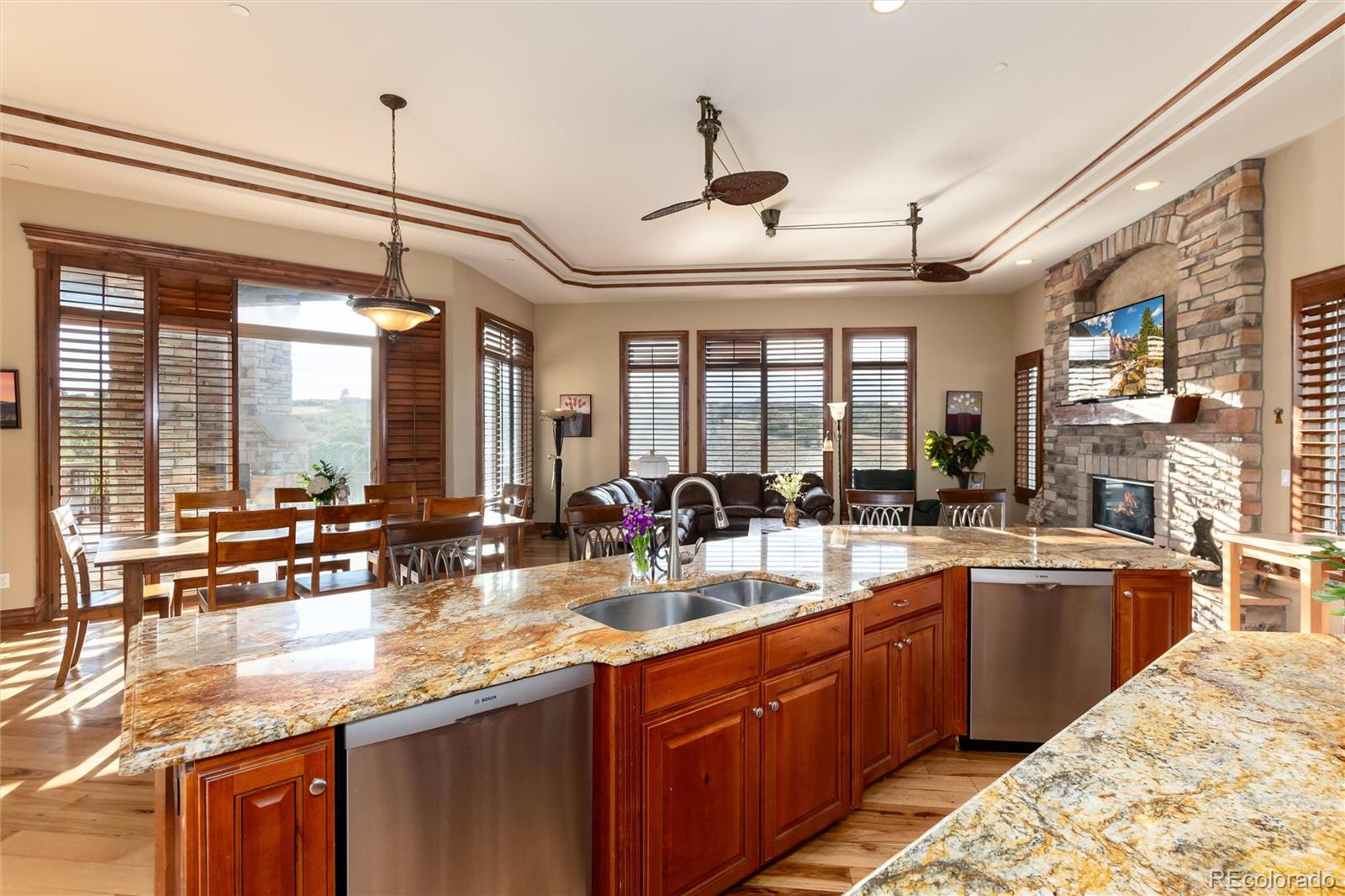 13079 Whisper Canyon Road Castle Pines, CO 80108 - Photo 17 of 50 a kitchen with lots of counter top space