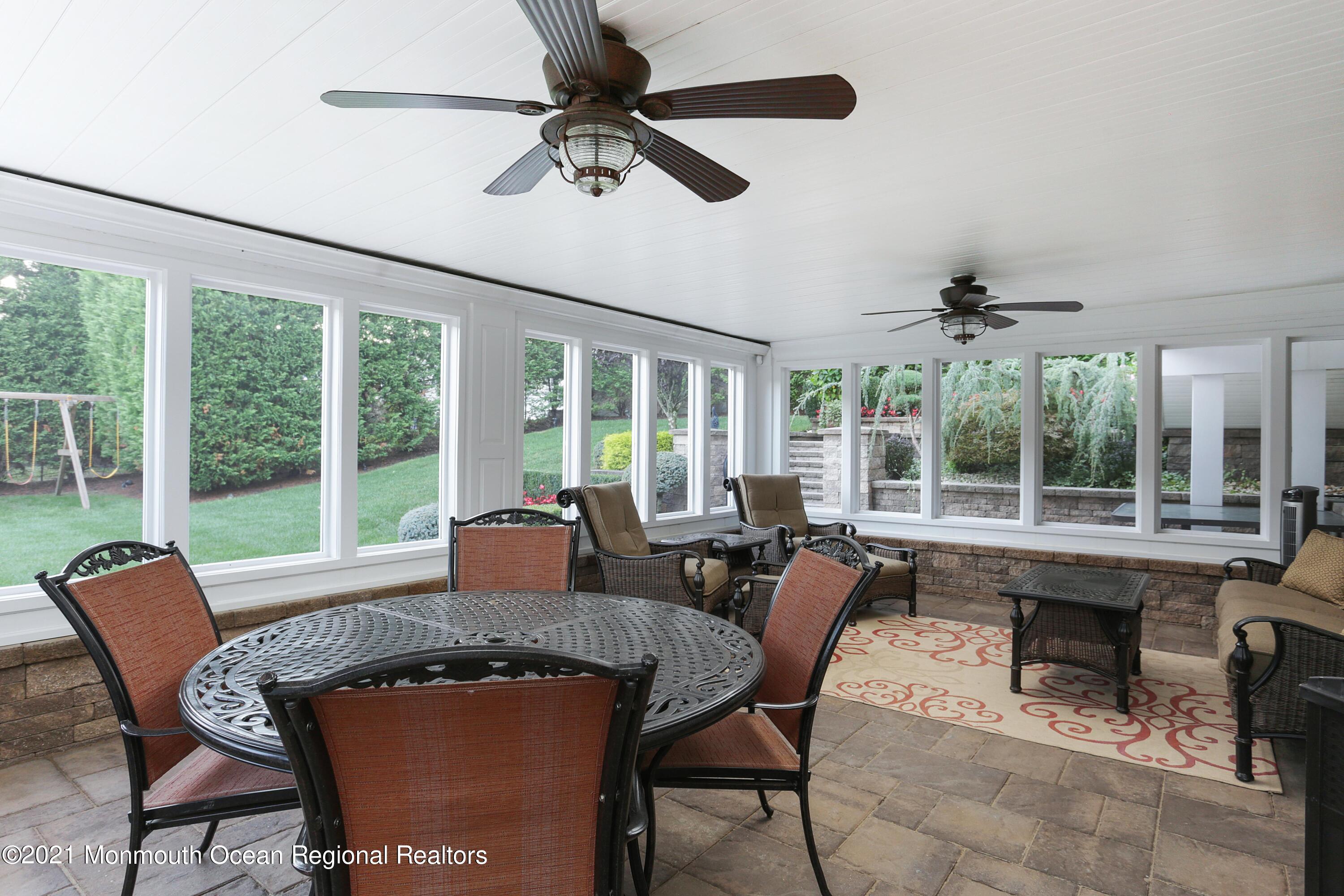 4 Yorktown Road Morganville, NJ 07751 - Photo 43 of 64 a view of a dining room with furniture window and outside view