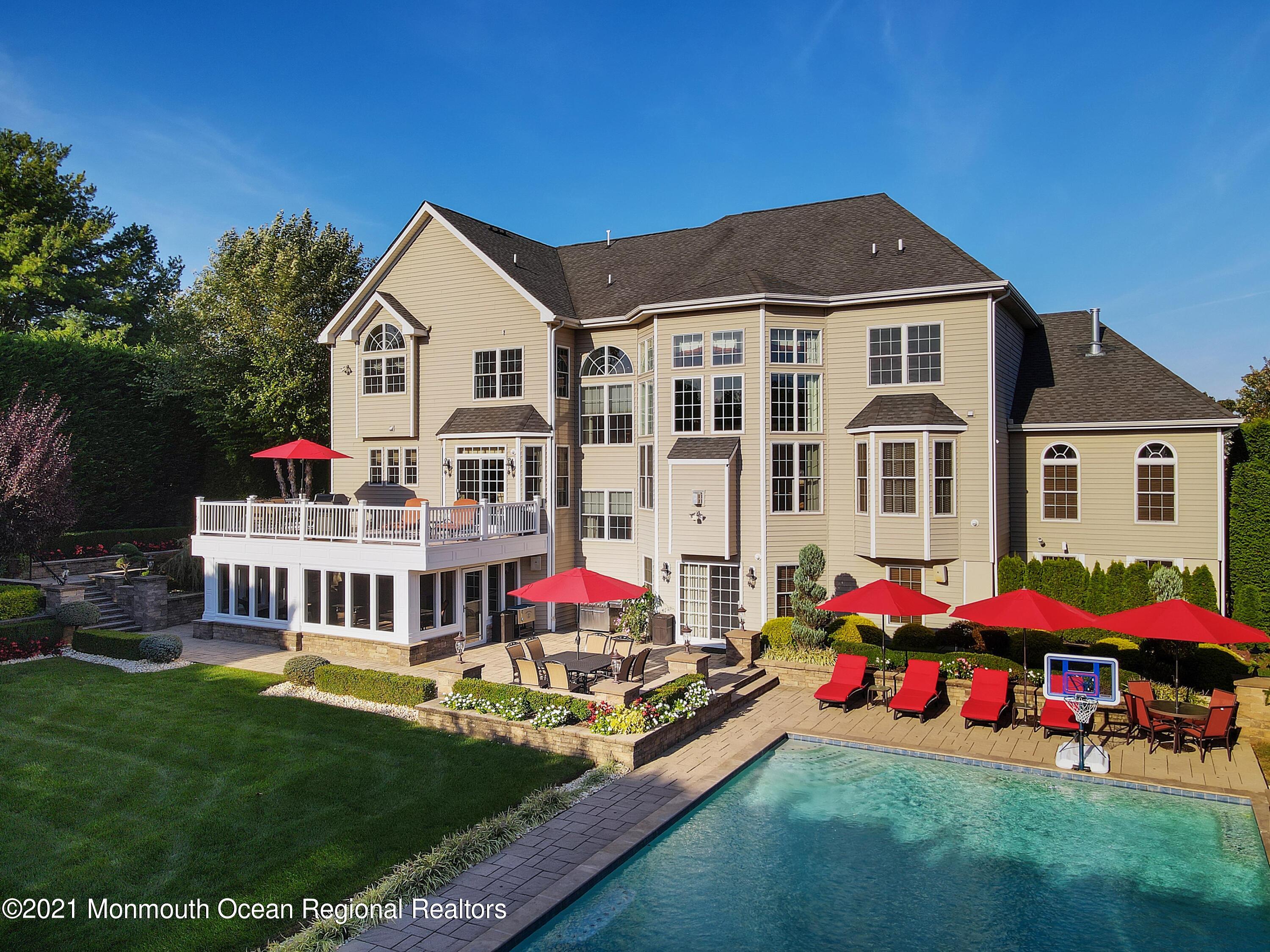 4 Yorktown Road Morganville, NJ 07751 - Photo 58 of 64 a front view of house with yard and trees