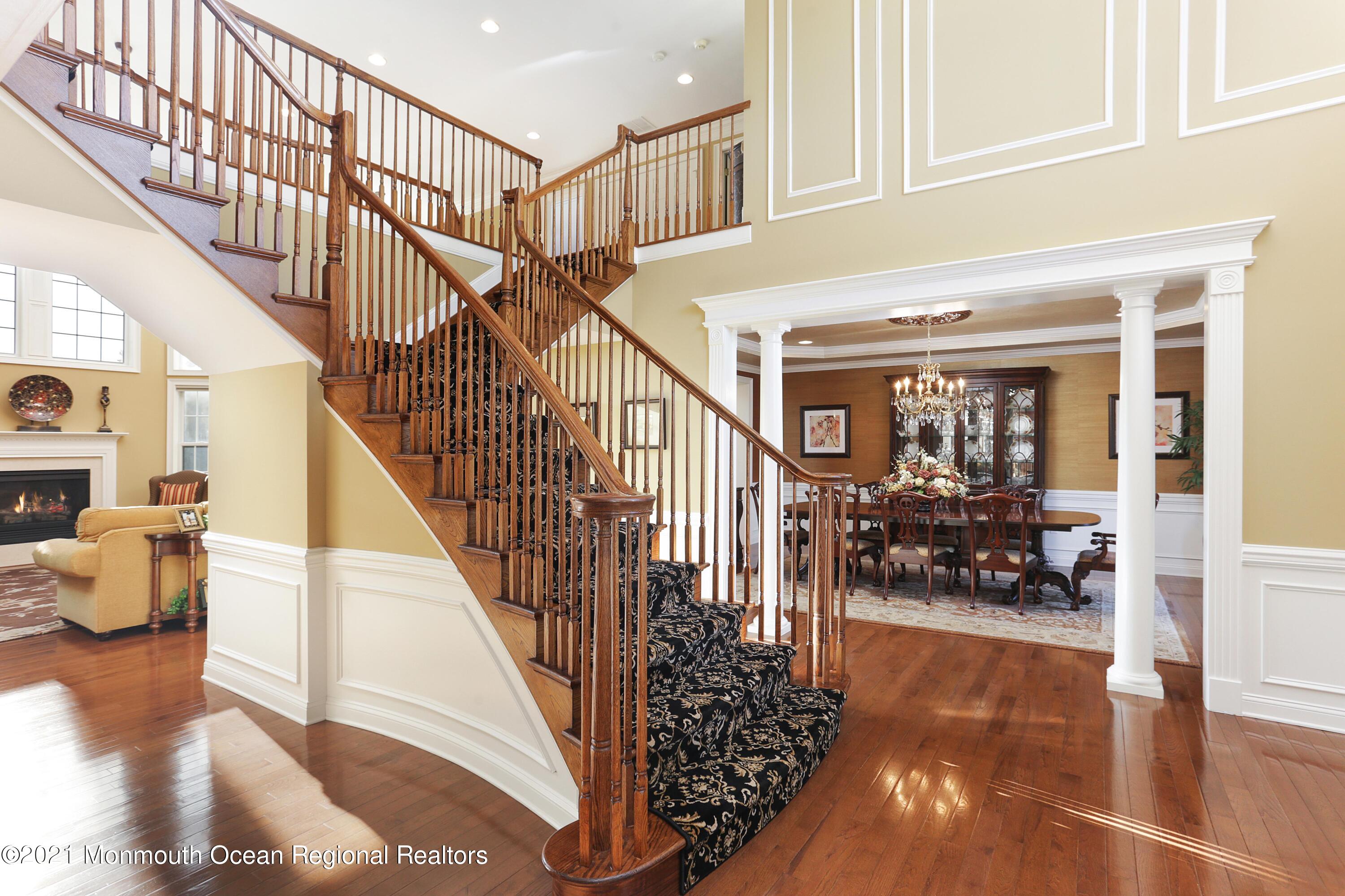 4 Yorktown Road Morganville, NJ 07751 - Photo 7 of 64 a view of entryway and hall with wooden floor