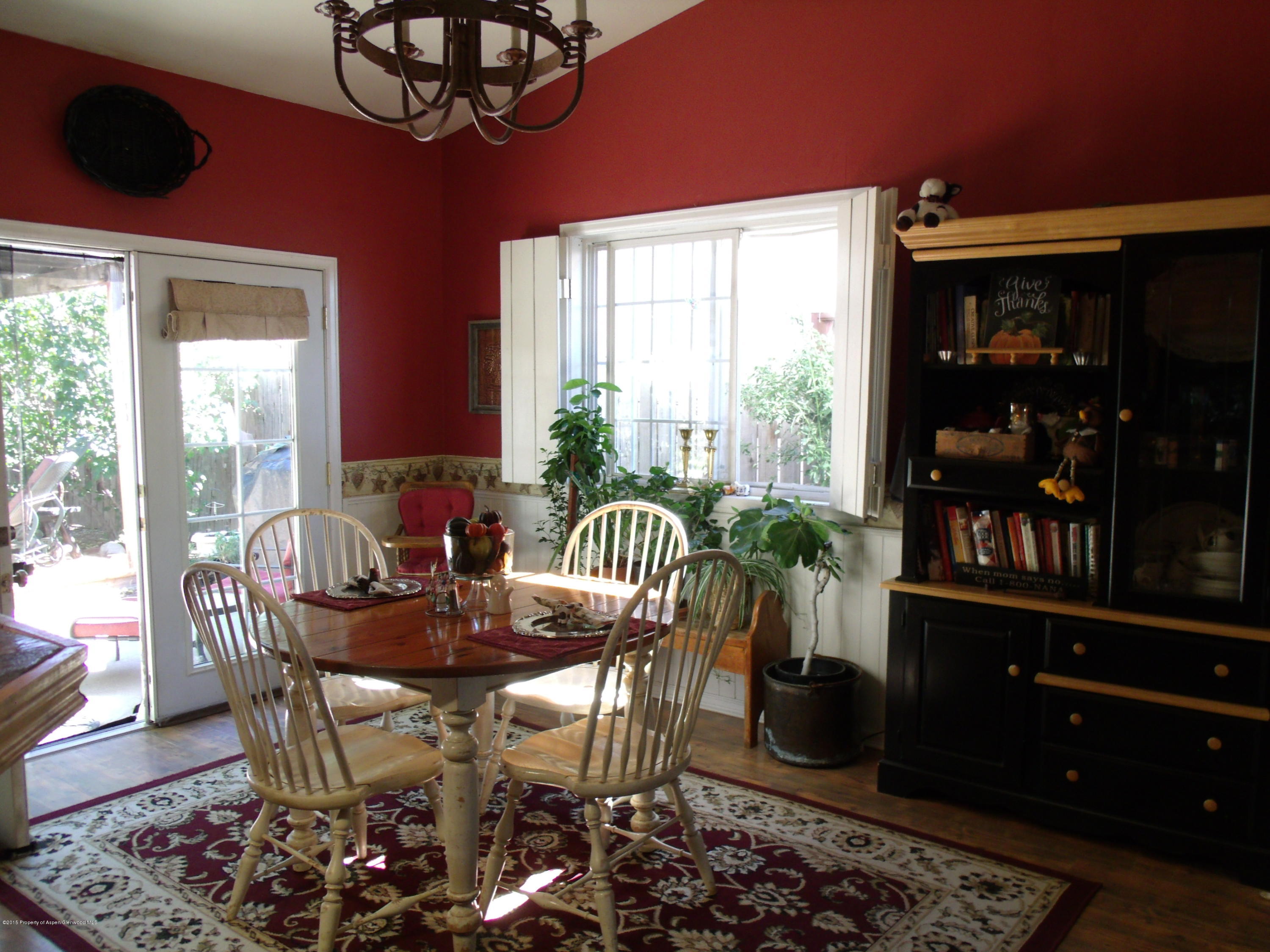 570 Elm Court Rifle, CO 81650 - Photo 5 of 15 a view of a dining room with furniture window and outside view