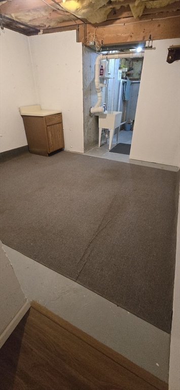 9 Arbor Road, Unit 9 Dracut, MA 01826 - Photo 22 of 27 a view of a room with wooden floor