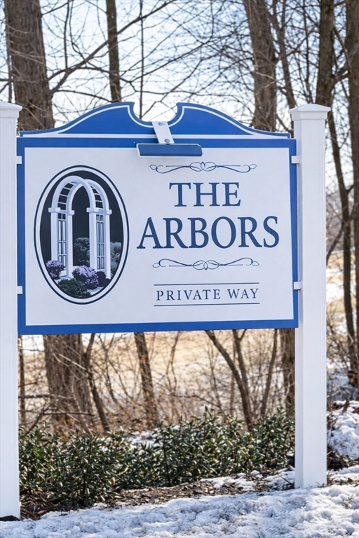9 Arbor Road, Unit 9 Dracut, MA 01826 - Photo 27 of 27 a front view of a building with a sign broad