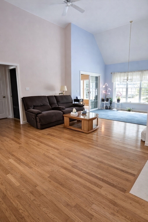 9 Arbor Road, Unit 9 Dracut, MA 01826 - Photo 4 of 27 a living room with furniture window and wooden floor