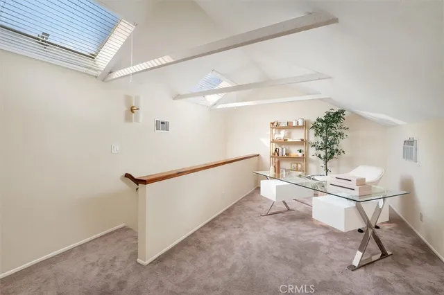 a room with table and chairs