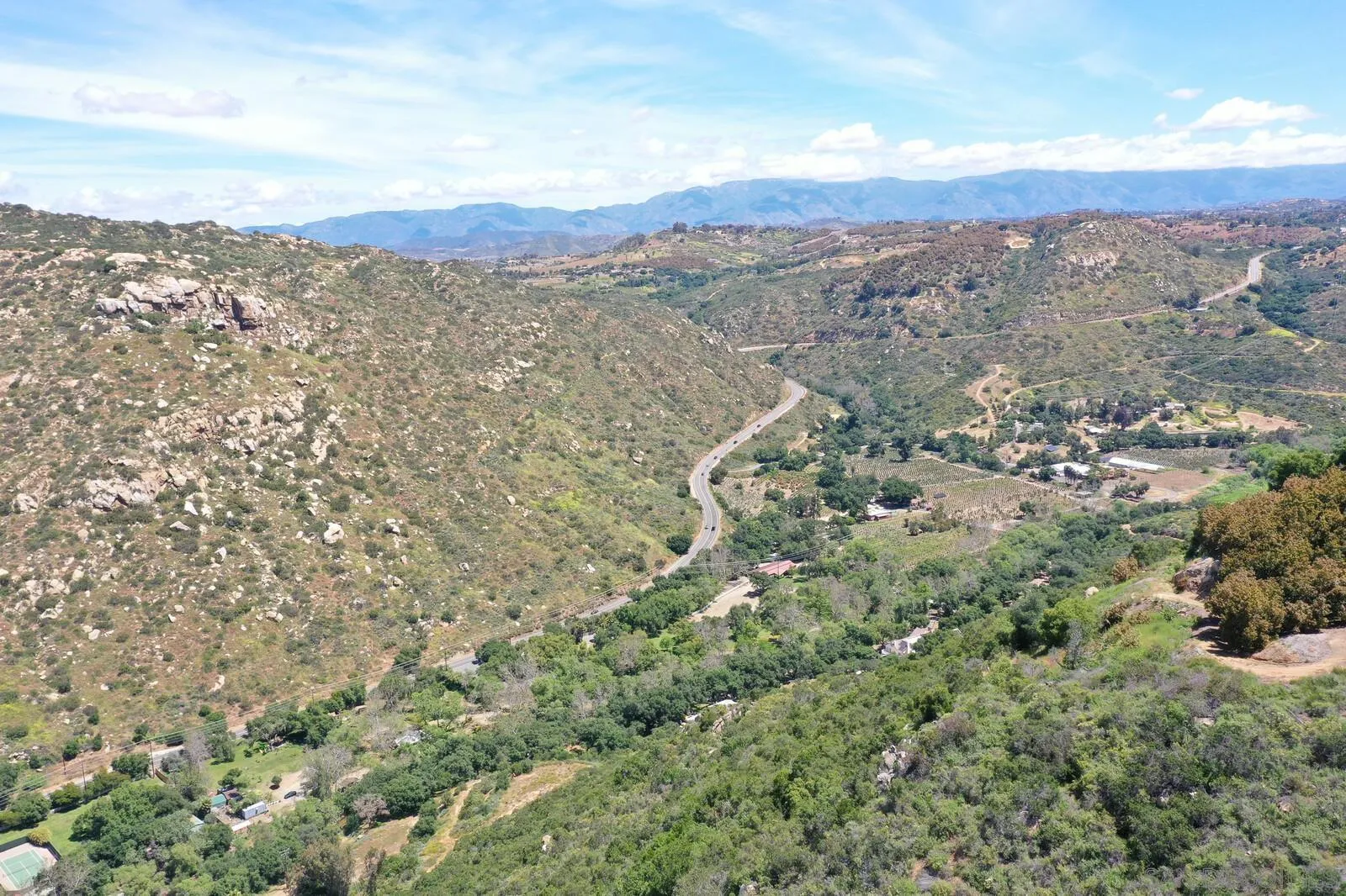 28555 Gordon Hill Road Valley Center, CA 92082 - Photo 7 of 10 a view of a city with mountains in the background
