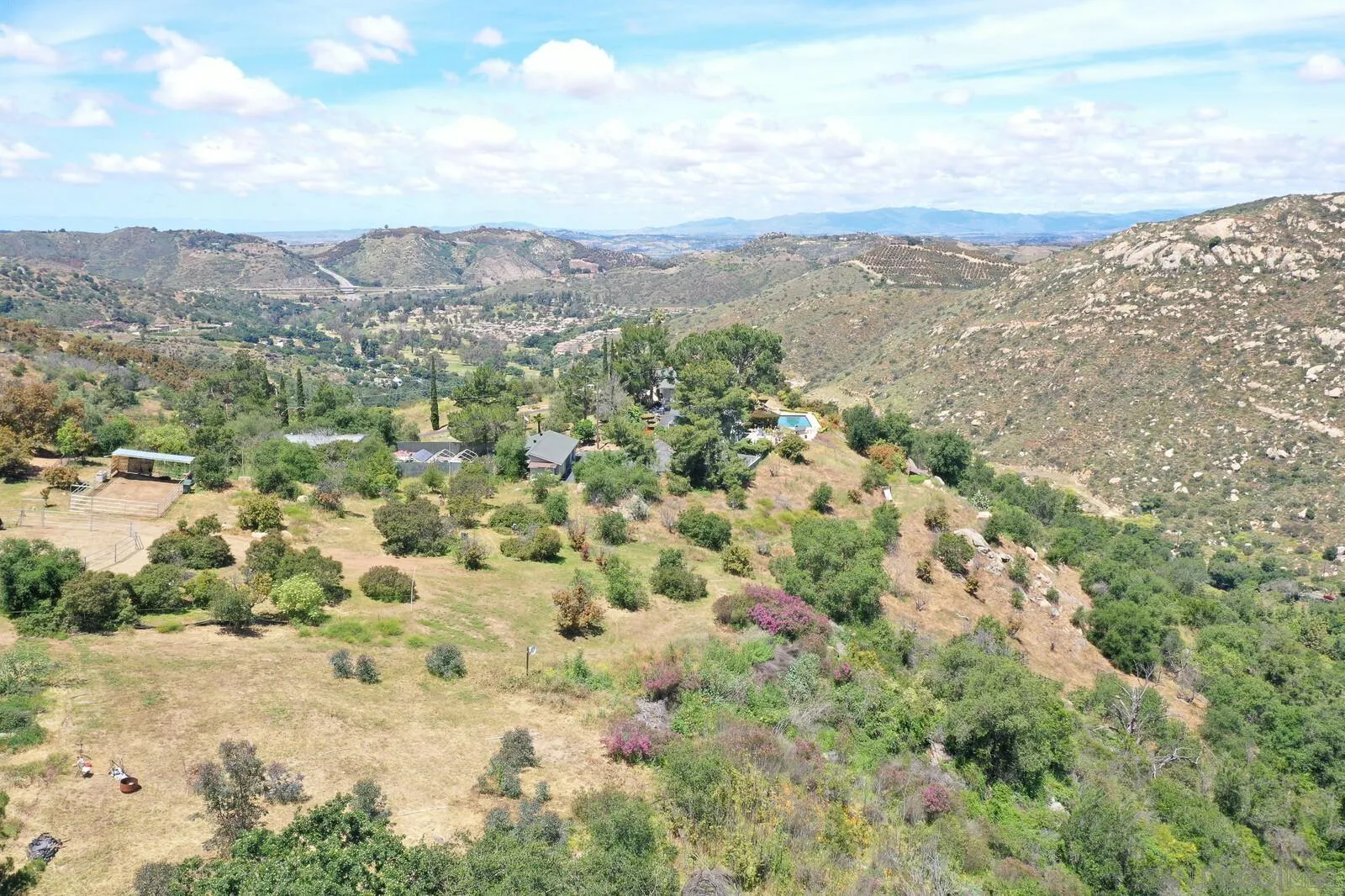 28555 Gordon Hill Road Valley Center, CA 92082 - Photo 8 of 10 a view of a city with mountains in the background