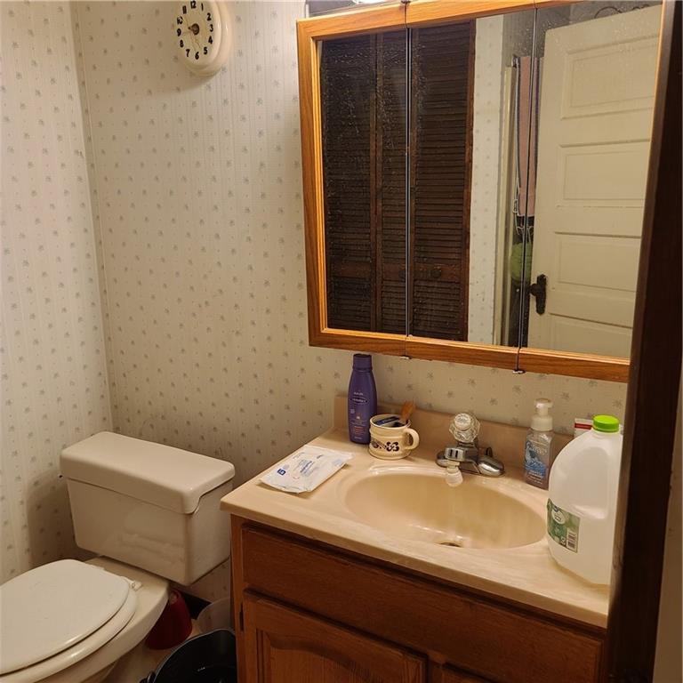 502 Gardner Road New Castle, PA 16101 - Photo 12 of 14 a bathroom with a sink and a toilet