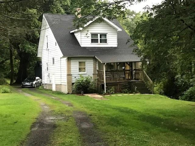 502 Gardner Road New Castle, PA 16101 - Photo 3 of 14 a front view of house with yard and green space