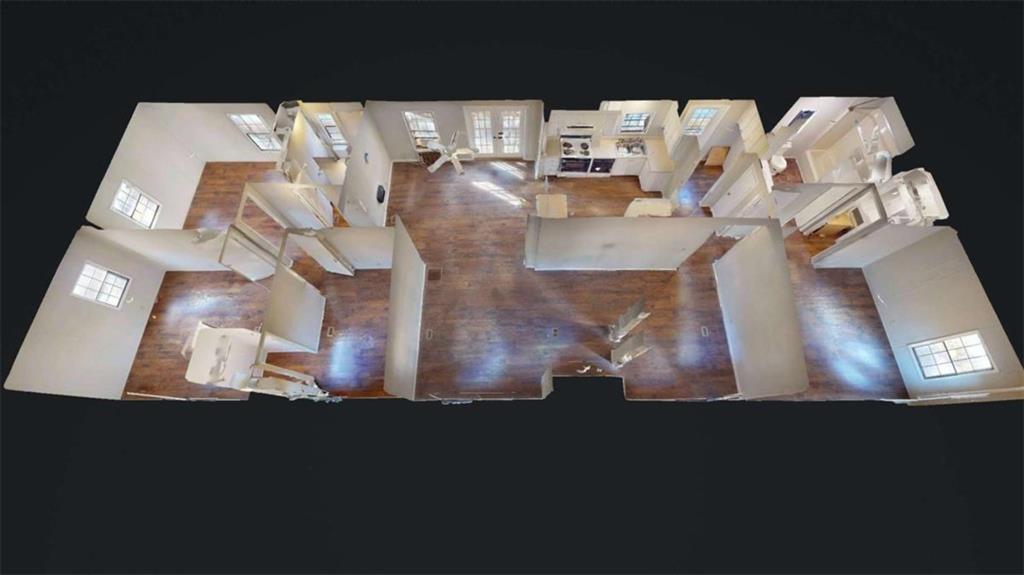 1210 Lee Peters Road Loganville, GA 30052 - Photo 4 of 32 a view of water heater room with wooden floor