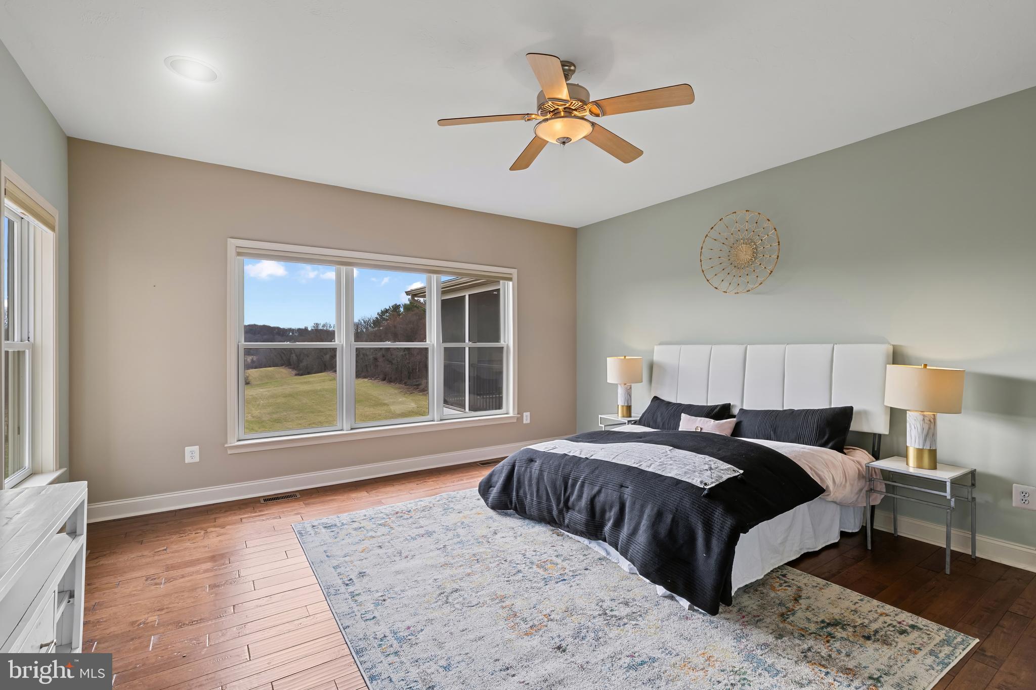 3239 Dry Branch Road White Hall, MD 21161 - Photo 32 of 56 a bedroom with a large bed and a window