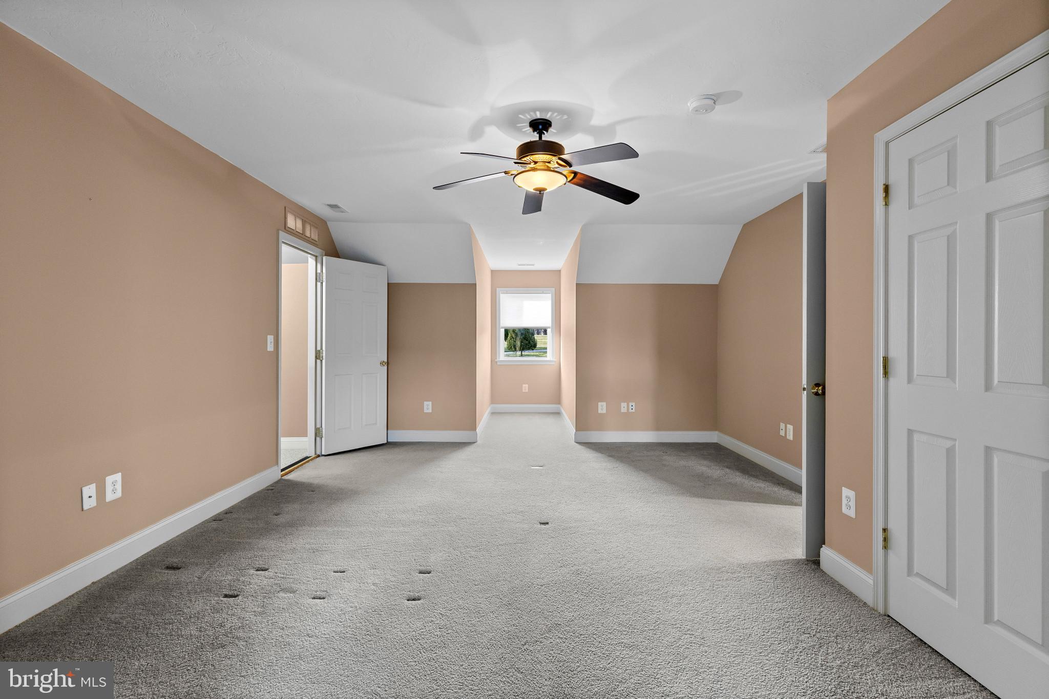 3239 Dry Branch Road White Hall, MD 21161 - Photo 41 of 56 a view of a livingroom with a ceiling fan