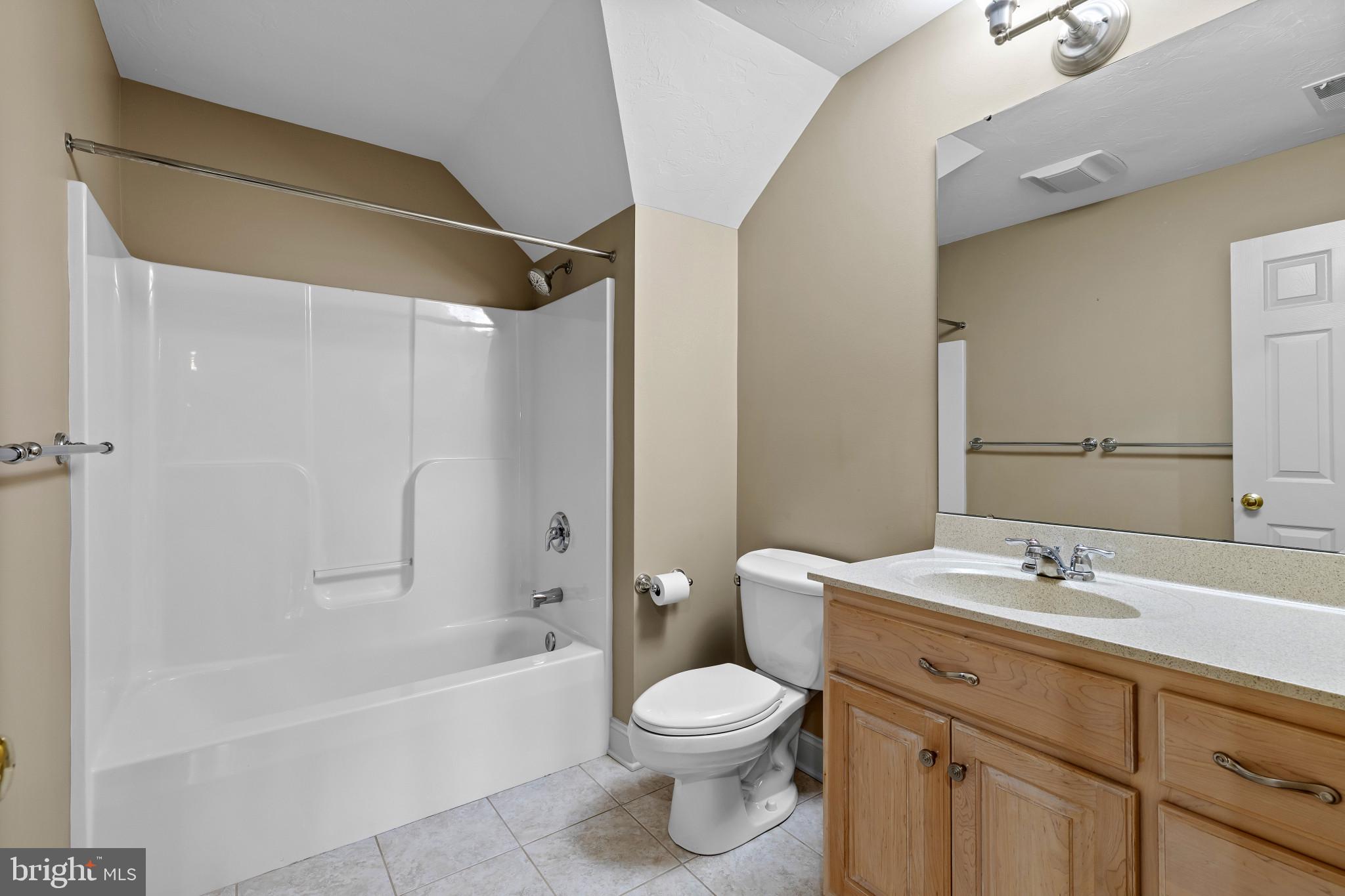 3239 Dry Branch Road White Hall, MD 21161 - Photo 42 of 56 a bathroom with a sink a toilet and a bathtub