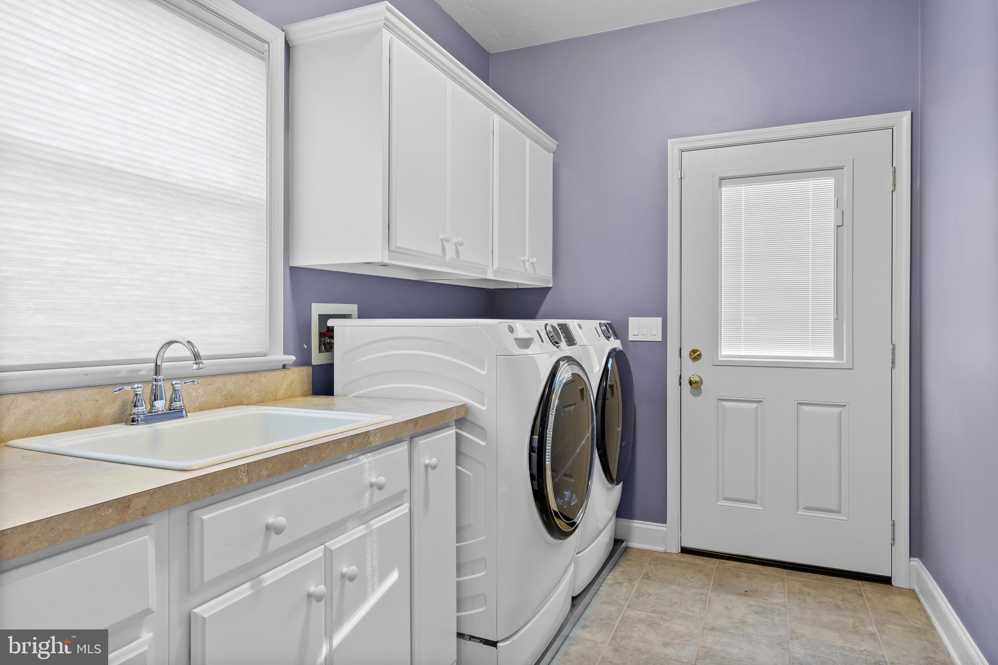 3239 Dry Branch Road White Hall, MD 21161 - Photo 43 of 56 a utility room with sink dryer and washer