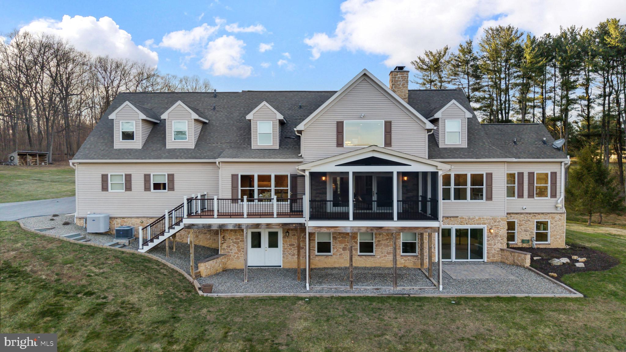 3239 Dry Branch Road White Hall, MD 21161 - Photo 52 of 56 front view of a house with a yard