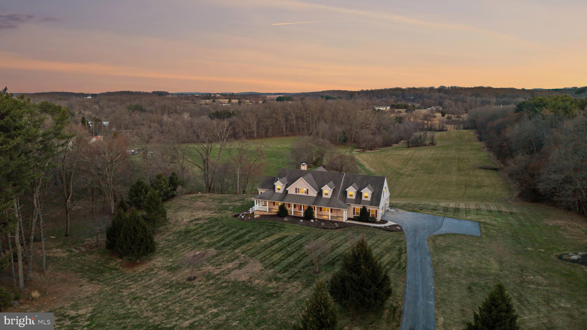 3239 Dry Branch Road White Hall, MD 21161 - Photo 55 of 56 a view of a lake with a mountain in the background