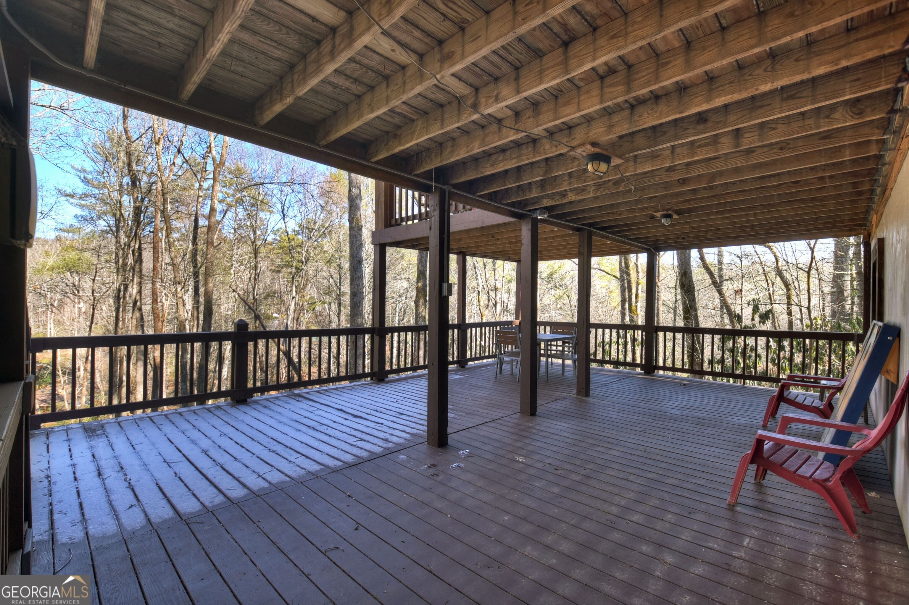134 Hemlock Circle, Unit 54 Blue Ridge, GA 30513 - Photo 38 of 43 a view of porch with wooden floor