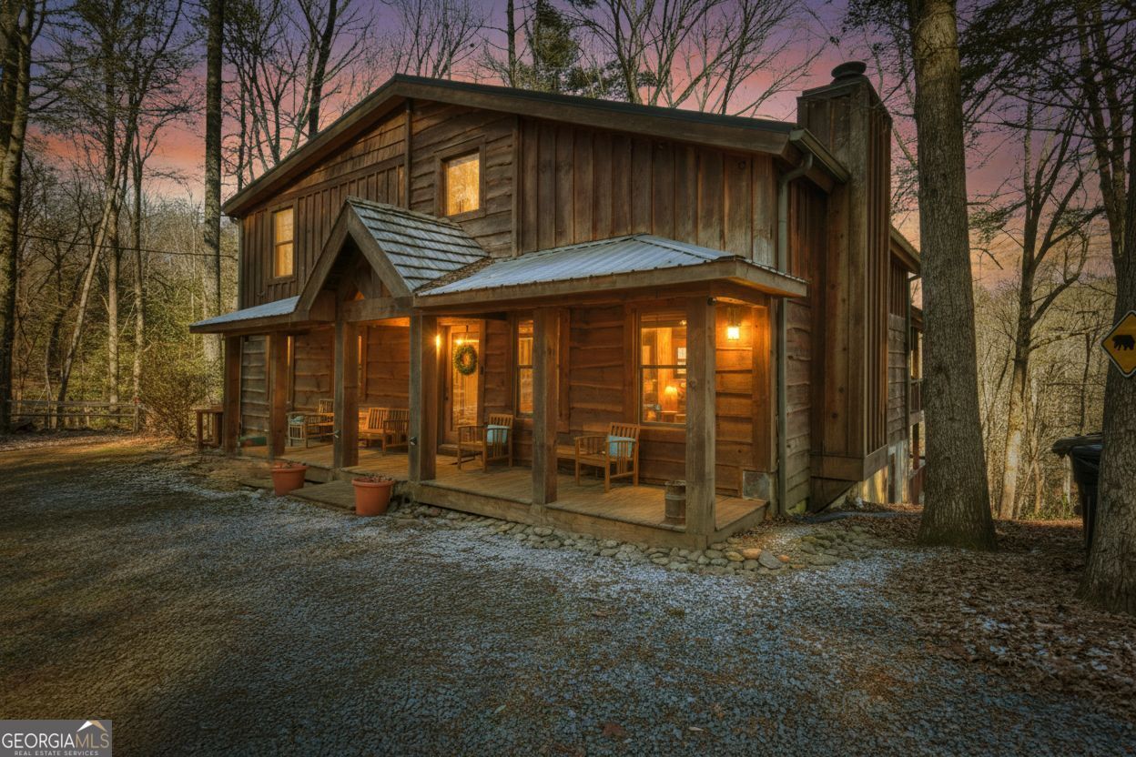 134 Hemlock Circle, Unit 54 Blue Ridge, GA 30513 - Photo 43 of 43 a view of a house with a yard