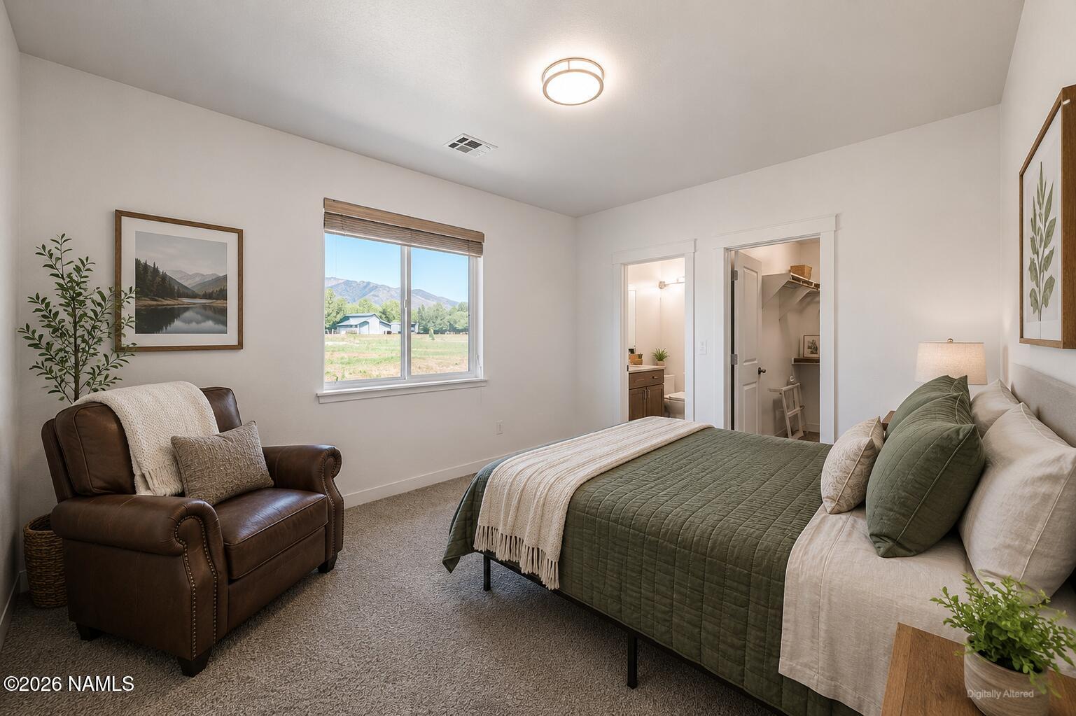 10272 Fw Mclure Road Flagstaff, AZ 86004 - Photo 11 of 38 a bedroom with a bed and a couch