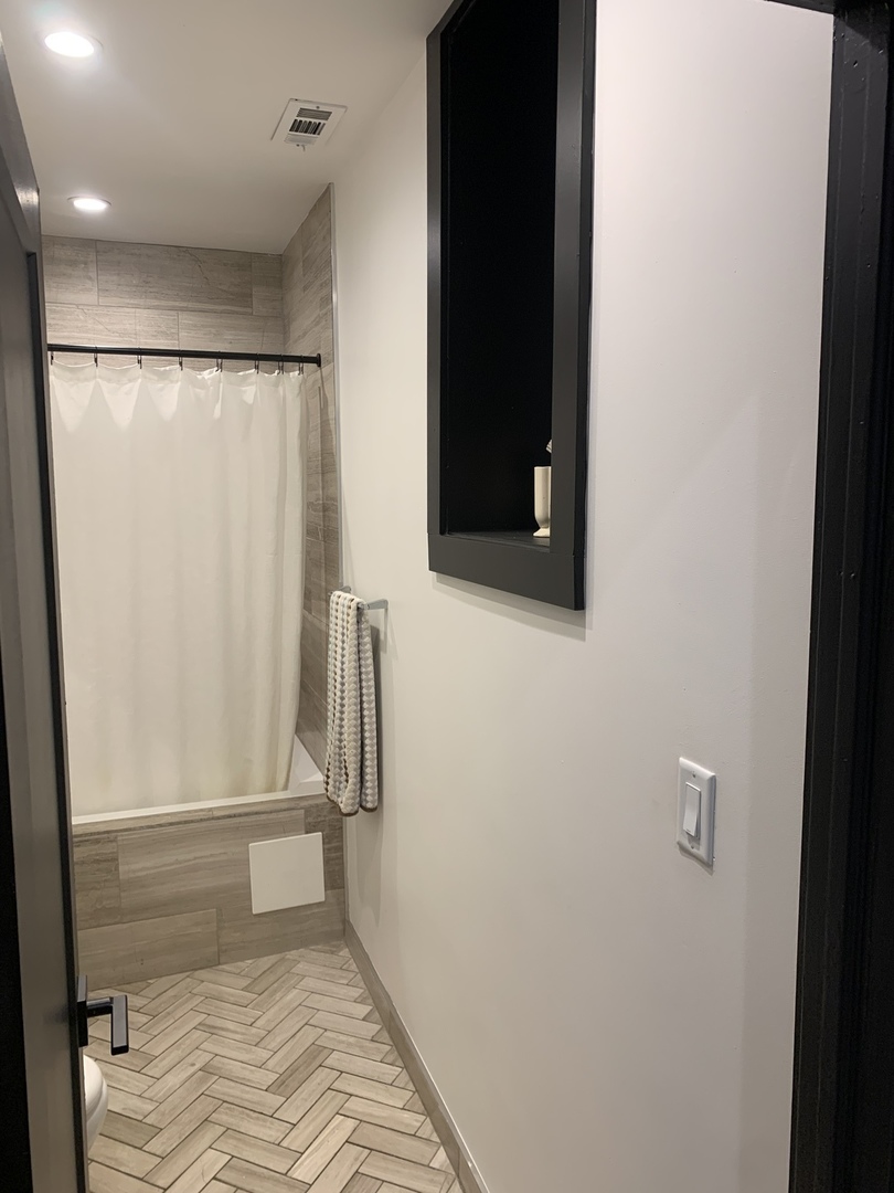 5259 West Roscoe Street, Unit 1F Chicago, IL 60641 - Photo 34 of 53 a view of bathroom