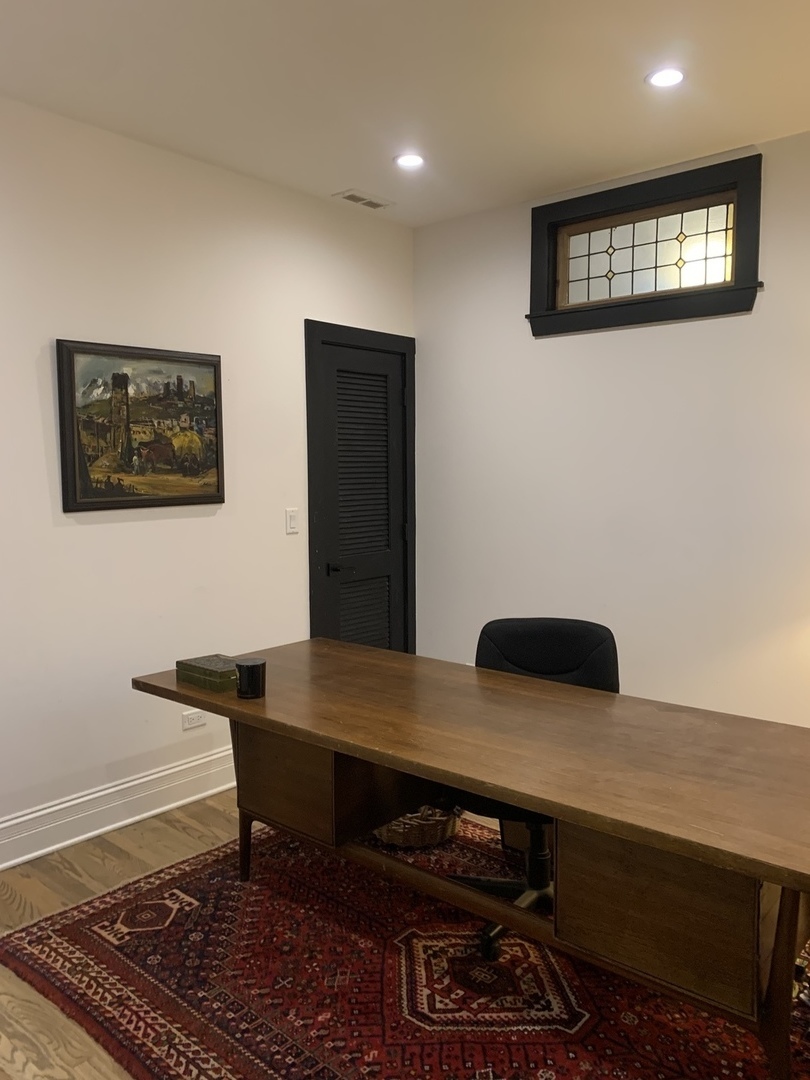 5259 West Roscoe Street, Unit 1F Chicago, IL 60641 - Photo 38 of 53 a view of a livingroom with furniture