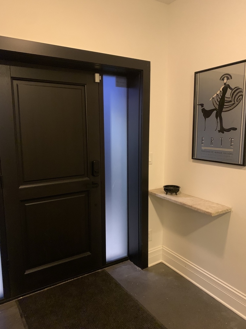 5259 West Roscoe Street, Unit 1F Chicago, IL 60641 - Photo 52 of 53 a view of cupboard