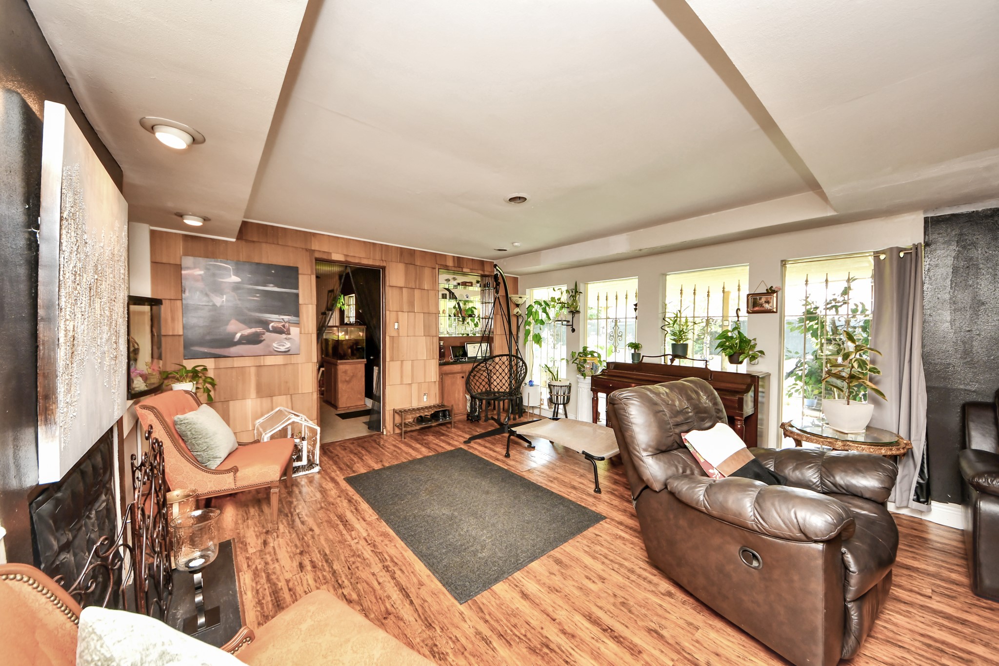 3901 Jeanetta Street Houston, TX 77063 - Photo 15 of 41 Den expansion includes fireplace and plenty of natural light.
