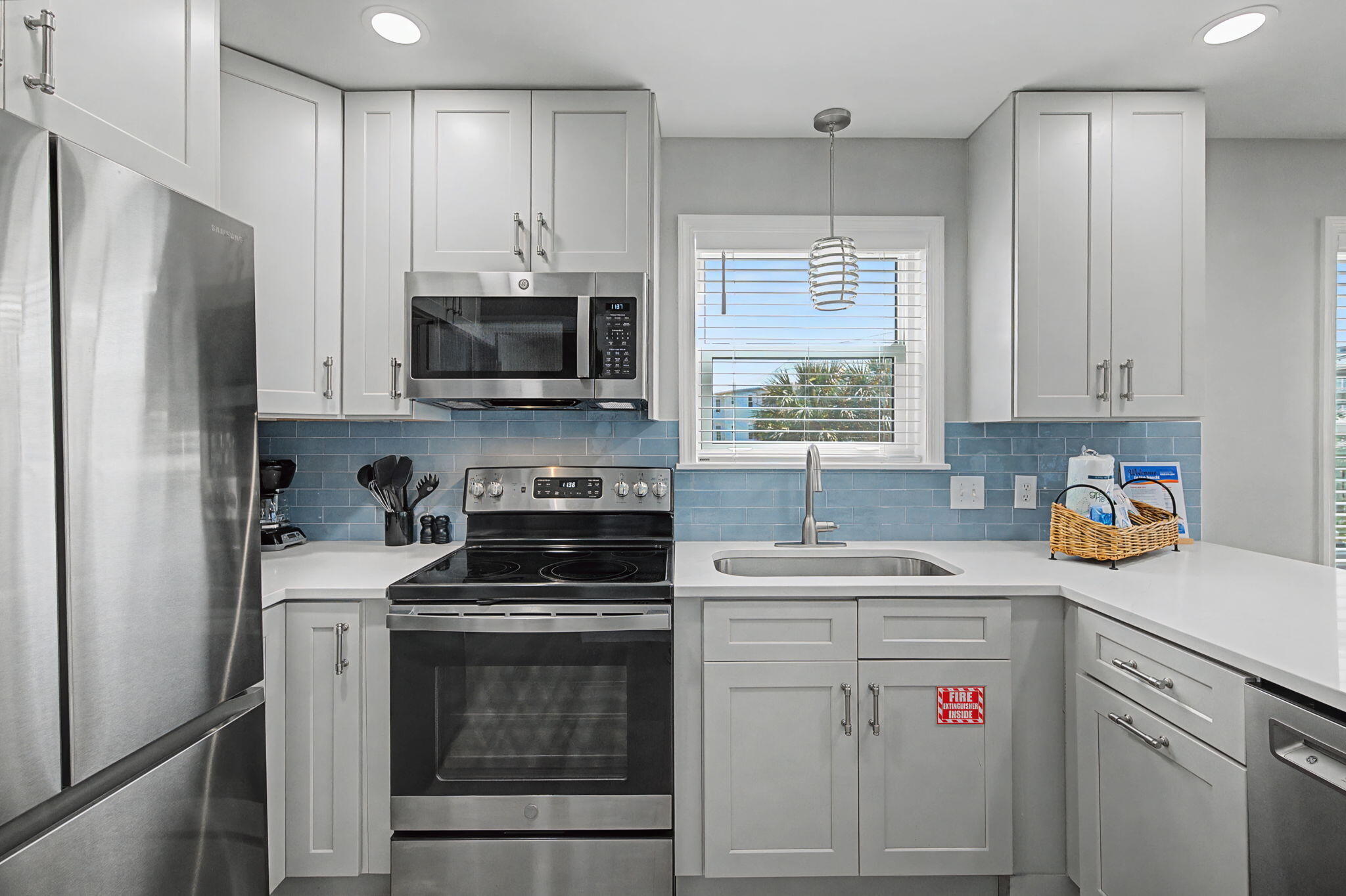 11 Beachside Drive, Unit 523 Santa Rosa Beach, FL 32459 - Photo 11 of 32 a kitchen with a sink stove and refrigerator