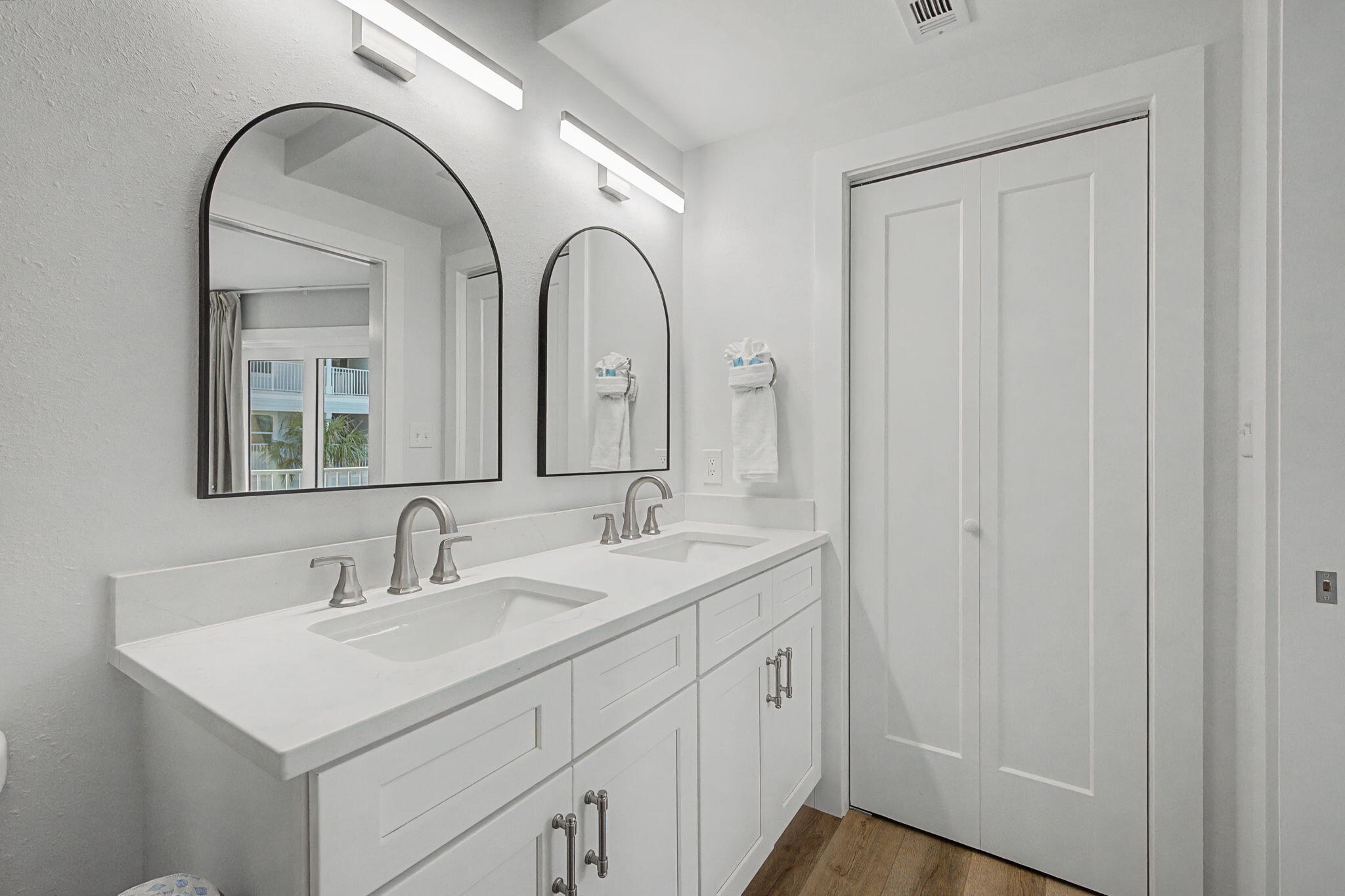 11 Beachside Drive, Unit 523 Santa Rosa Beach, FL 32459 - Photo 15 of 32 a bathroom with a double vanity sink and mirror