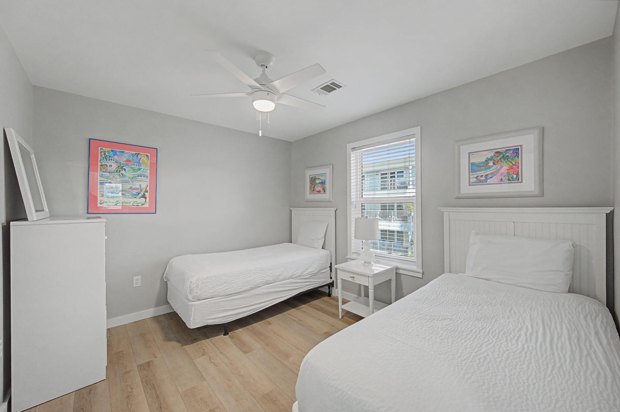 11 Beachside Drive, Unit 523 Santa Rosa Beach, FL 32459 - Photo 18 of 32 a bedroom with two beds and a large window