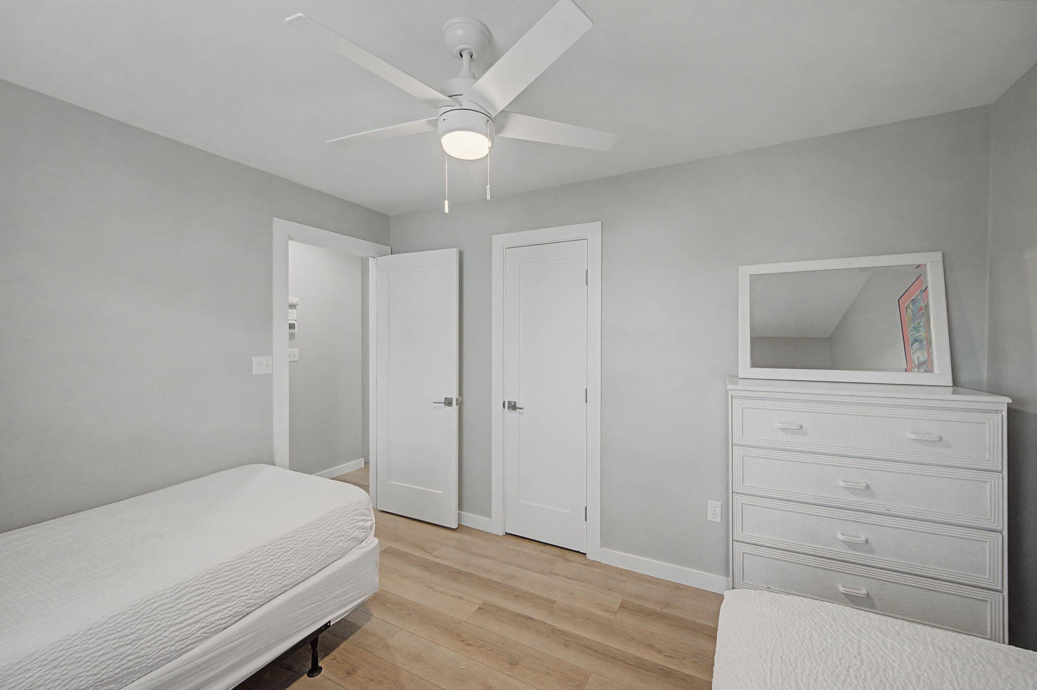 11 Beachside Drive, Unit 523 Santa Rosa Beach, FL 32459 - Photo 19 of 32 a bedroom with a bed and a dresser