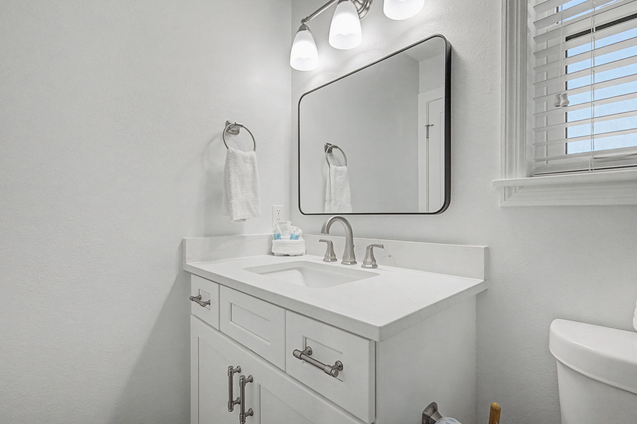 11 Beachside Drive, Unit 523 Santa Rosa Beach, FL 32459 - Photo 20 of 32 a bathroom with 2 sink and a mirror
