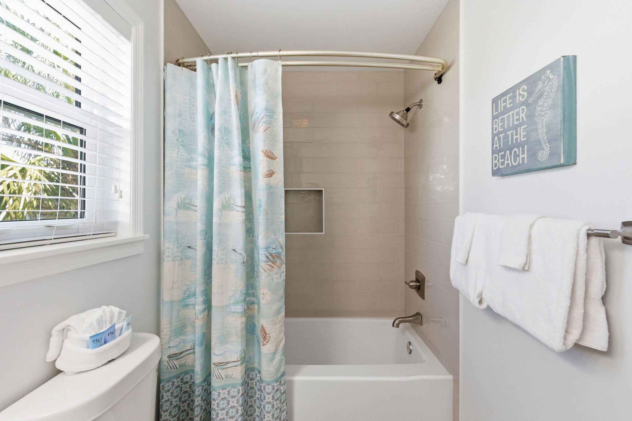 11 Beachside Drive, Unit 523 Santa Rosa Beach, FL 32459 - Photo 21 of 32 a bathroom with a shower curtain and a sink