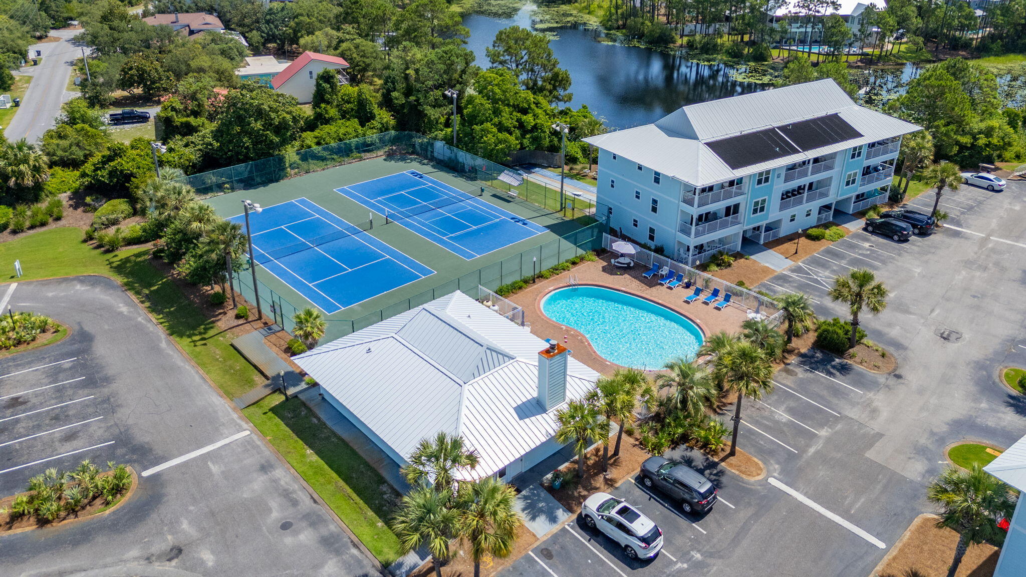 11 Beachside Drive, Unit 523 Santa Rosa Beach, FL 32459 - Photo 31 of 32 an aerial view of a house with a yard and garden