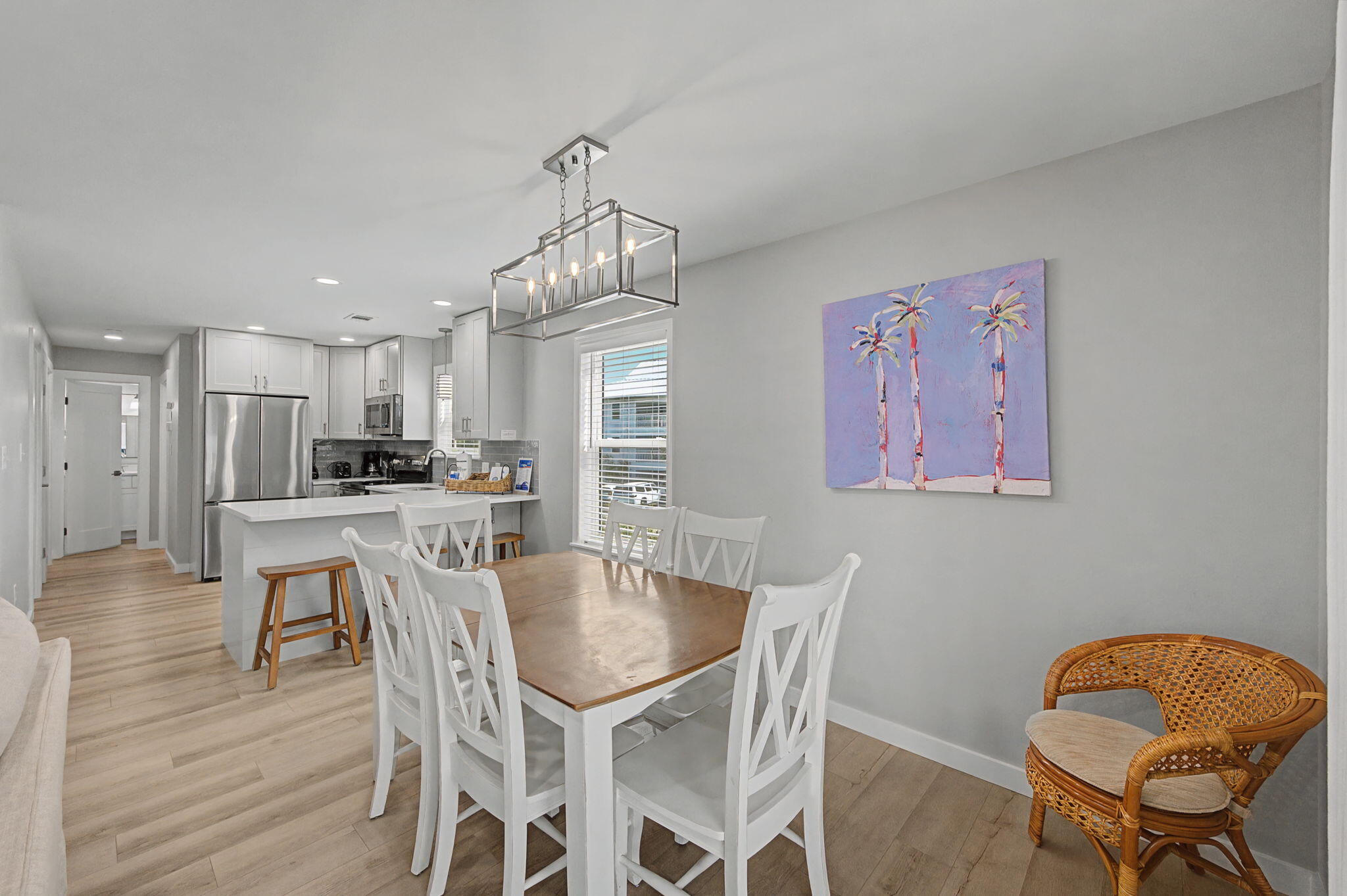 11 Beachside Drive, Unit 523 Santa Rosa Beach, FL 32459 - Photo 8 of 32 a view of a dining room with furniture and wooden floor