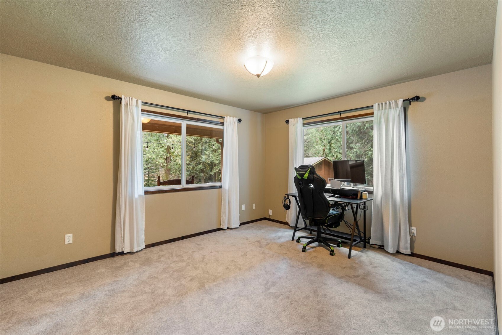 209 Alpha Way Onalaska, WA 98570 - Photo 16 of 40 a view of a workspace with furniture and a window